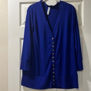 Blue sweater. 3/4 sleeves.
